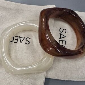 Brand new acrylic bangles/bracelets